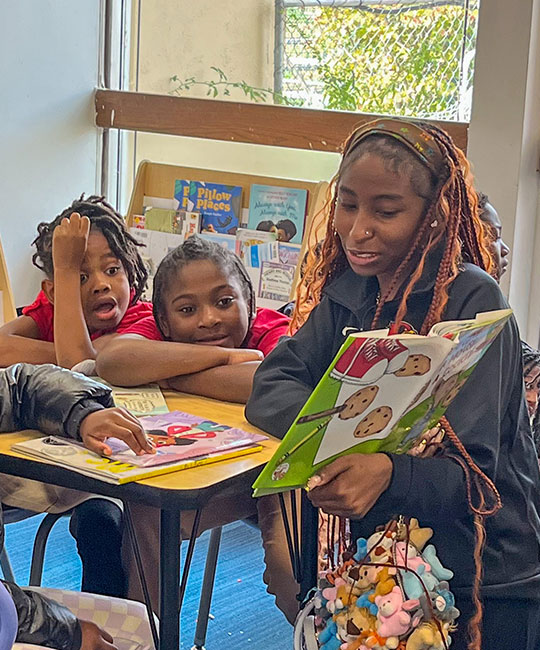 Photo: Lift for Life Academy. Young students at Lift for Life Academy enjoy story time. Lift for Life Academy Foundation and other YouthBridge Agency Fundholders recognize endowments as a vital component of their long-term growth, and a source of peace of mind about the future.