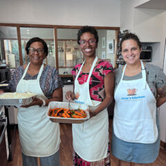 Elphanie Swift and Andranique Joe help prepare a meal for families at HavenHouse.